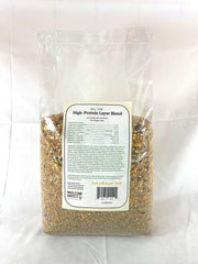 Wholesome Harvest layer blend closeup of cracked grains highlighting protein-rich nutrition