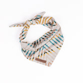 Wilderdog dog bandana cream material close-up shows breathable poly-blend mesh for comfort.