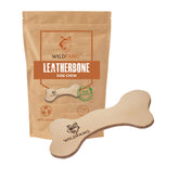 Wildfang leather dog toy large bone close-up showing natural texture for safe chewing.