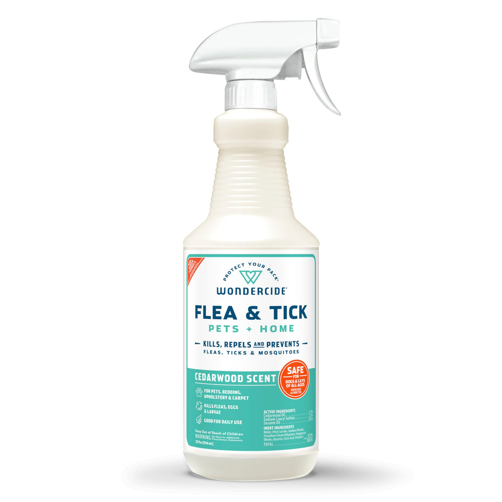 Wondercide flea tick spray bottle near a dog for natural pest control.