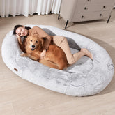 WOZOKE Human Dog Bed giant size beside a couch offers shared lounging for family moments.
