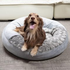 Xavaro cave dog bed donut plush rosy fur close-up highlighting cozy comfort.