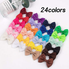 XIMA handmade grosgrain bows clip-back secure pet hairstyles.