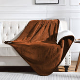 Yaning waterproof blanket on bed and couch provides spill protection for pets and upholstery.