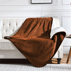 Yaning waterproof blanket on bed and couch provides spill protection for pets and upholstery.