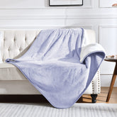 Yaning waterproof blanket on lilac bed shows leakproof protection and plush warmth