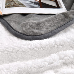 Yaning blanket plush flannel side for cozy comfort on couches.
