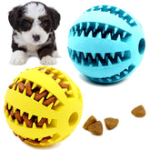 Youngever dog ball toy yellow with treat slots for rewards.