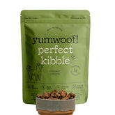 Yumwoof Perfect Kibble bag close-up showing digestion-supporting chicken ingredients.