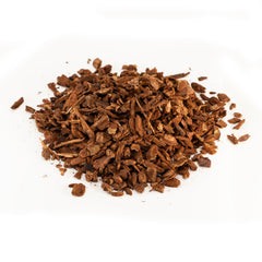 Zoo Med Reptile Bark Fir Bedding terrarium setup shows moisture-retaining substrate.