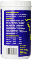 Zoo Med Spirulina 20 Flake close-up shows crisp flakes for varied fish diets.