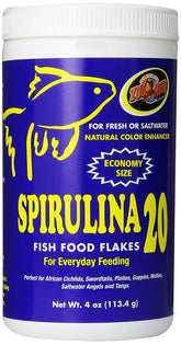 Zoo Med Spirulina 20 Flakes bottle shows high-protein color-enhancing fish food in use