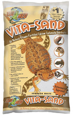 Zoo Med Vita-Sand Sonoran White, grano ultrafino para evitar impacción y mantener sustrato estable.