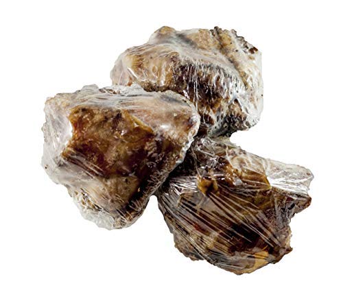 123 Treats Knee Cap Beef Bones dog chew action shows durable, long-lasting entertainment.