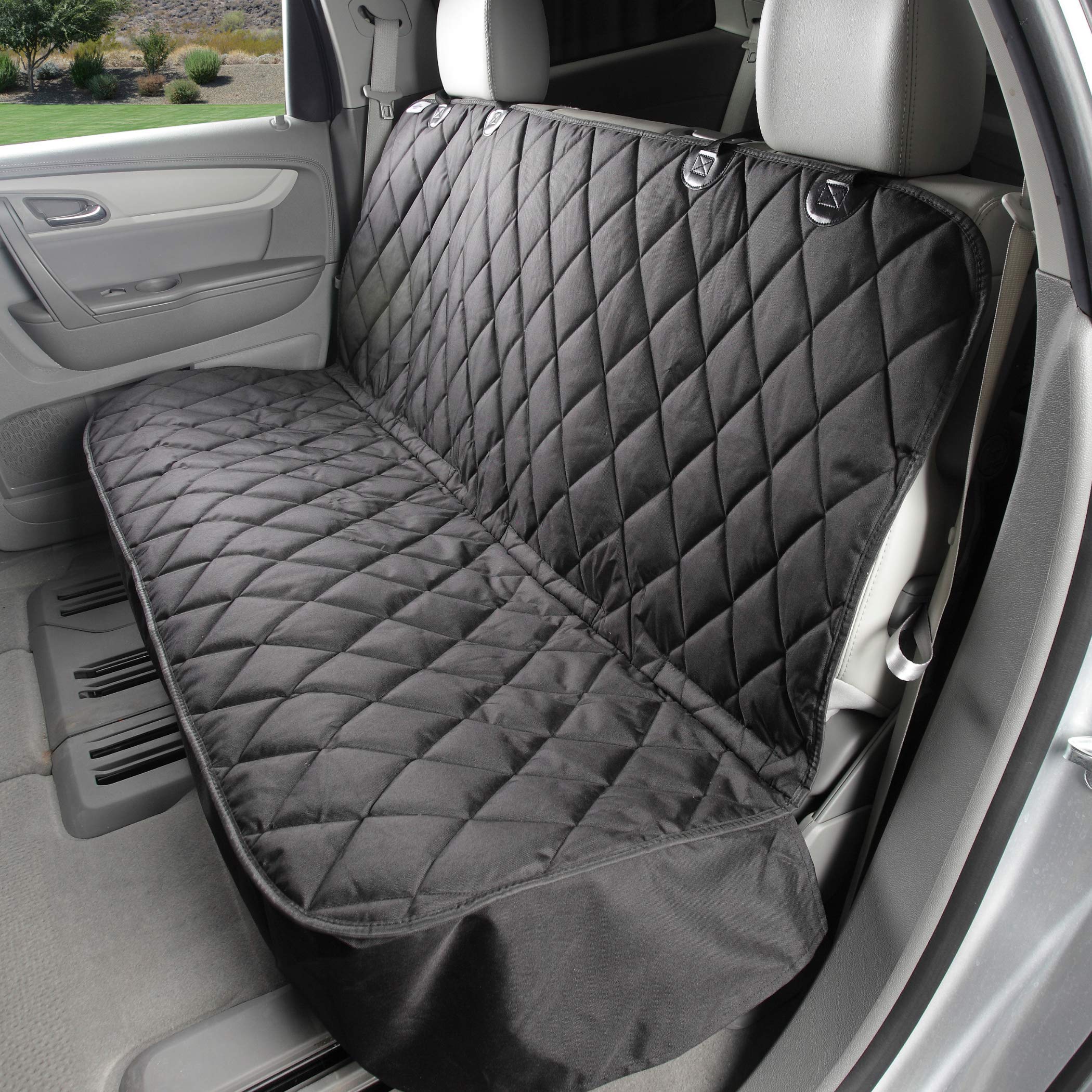 4Knines back-seat cover installed protects car upholstery during pet rides.