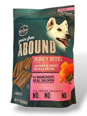 Abound Salmon & Sweet Potato Jerky Bites front bag highlights natural ingredients for healthy, tasty rewards.
