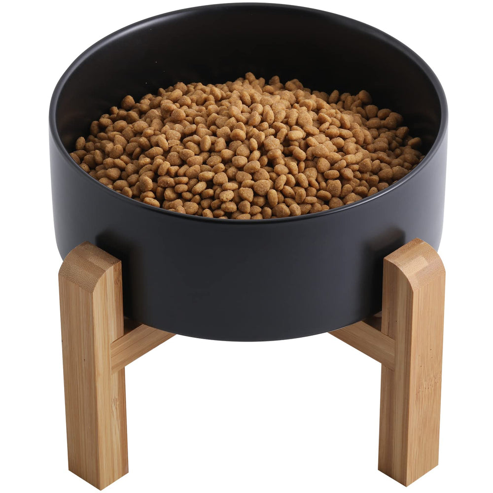 Addogyy black elevated ceramic dog bowl with wood stand for easy, comfortable meals.