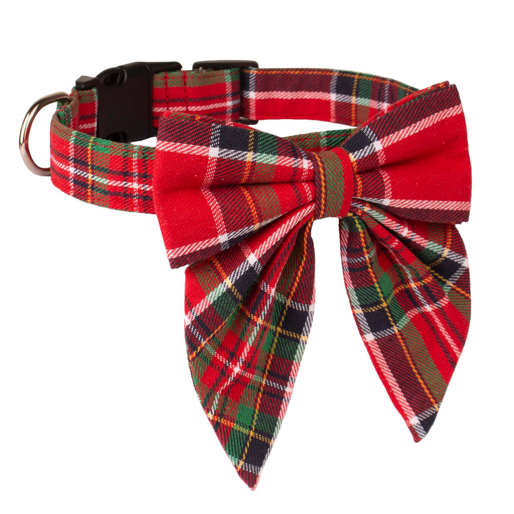 ADOGGYGO Christmas collar on a dog with bow for seasonal charm.