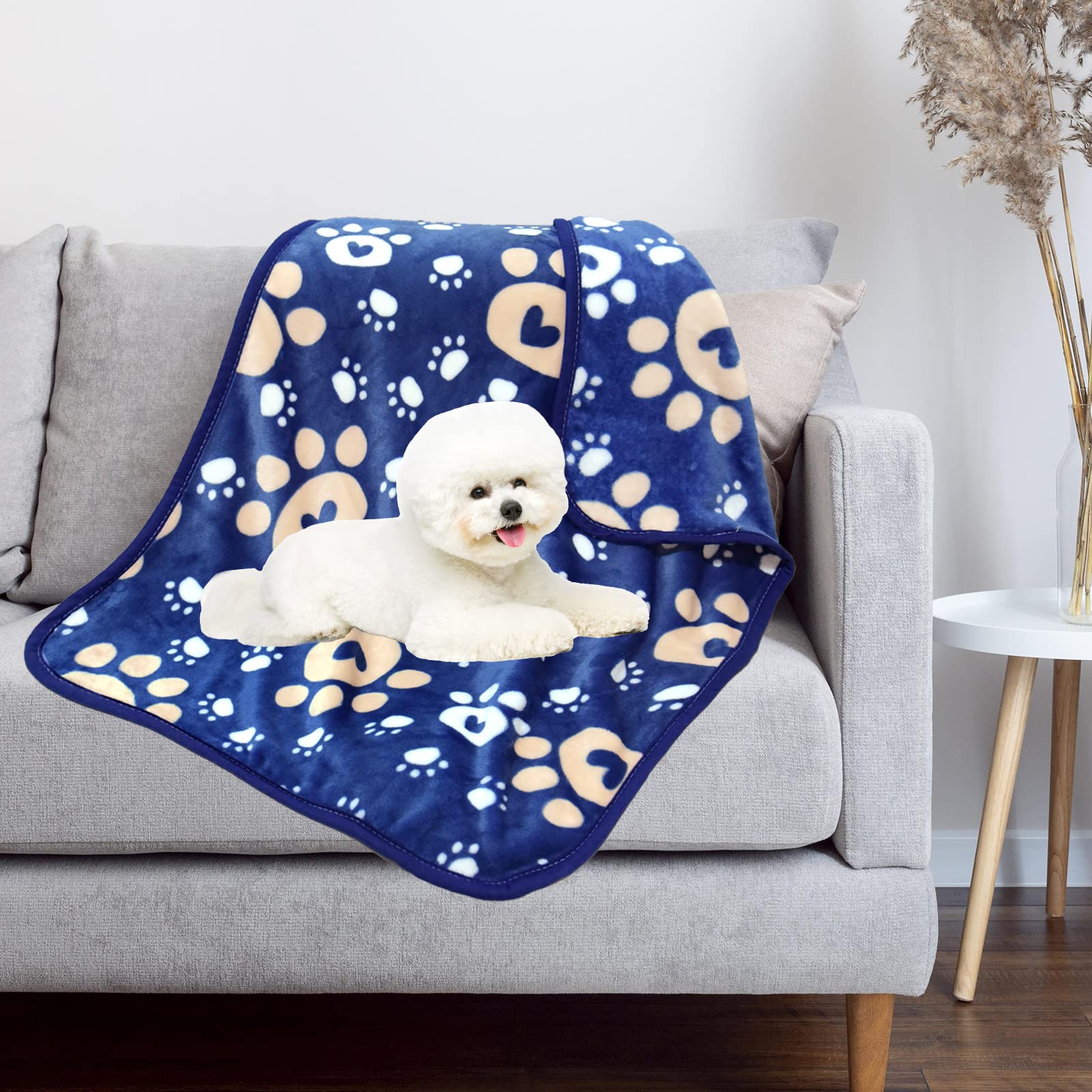 AHOOCUSTOM dog blanket on couch, fluffy fleece providing cozy resting spot.