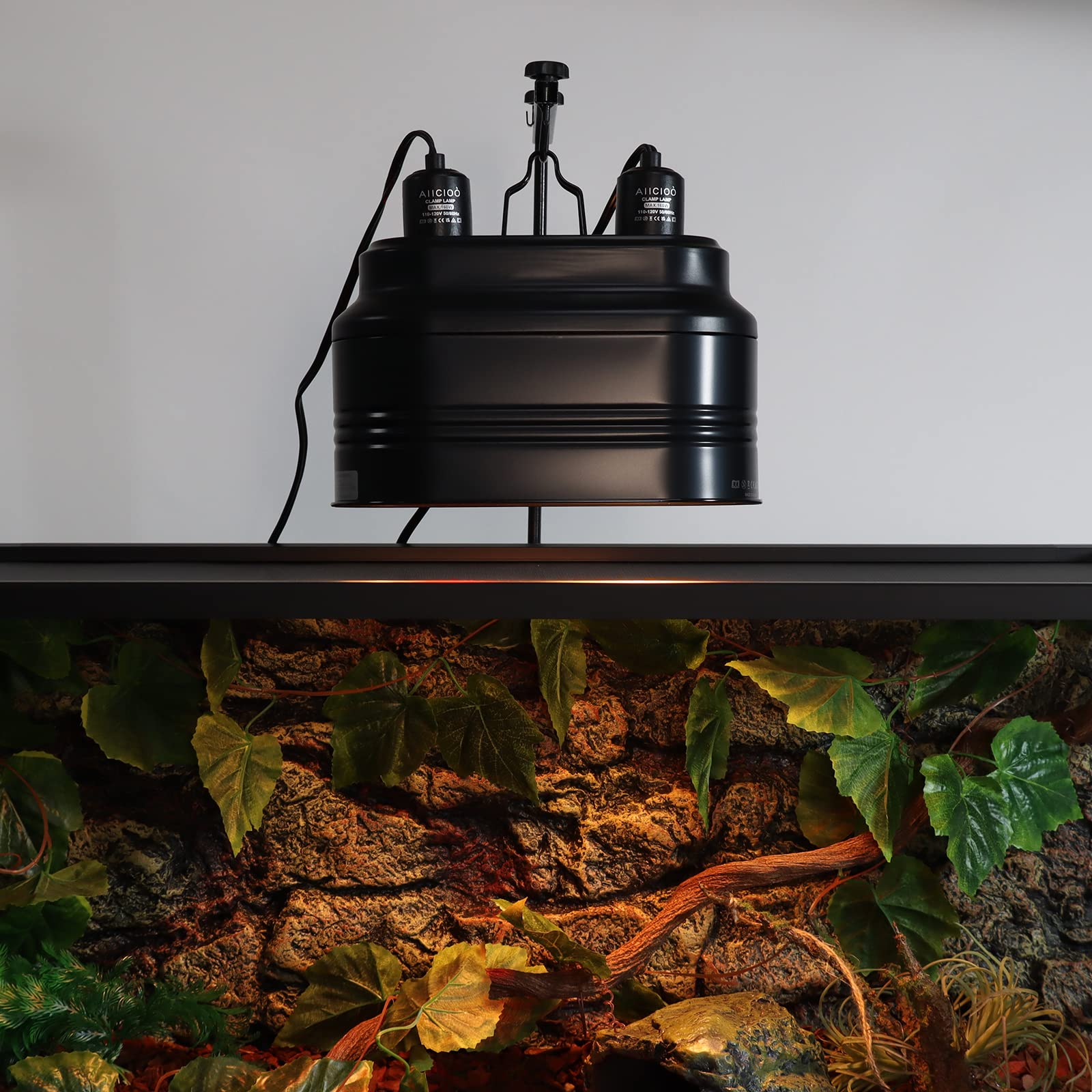Aiicioo dual reptile light fixture includes safety label for proper handling and installation.