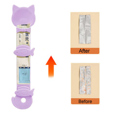 AionneWie cat treat spoons end-dispense close-up showing precise portion