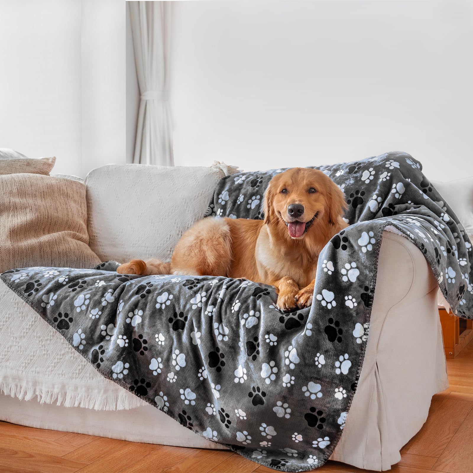 AIWEK waterproof pet blanket on a sofa shows water-repellent surface protecting furniture