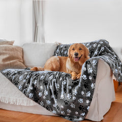 AIWEK waterproof pet blanket on a sofa shows water-repellent surface protecting furniture