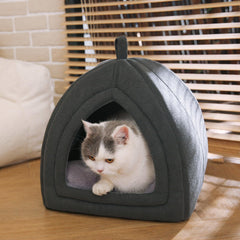 Amazon Basics cat cave bed non-slip base keeps the resting area stable on smooth floors.