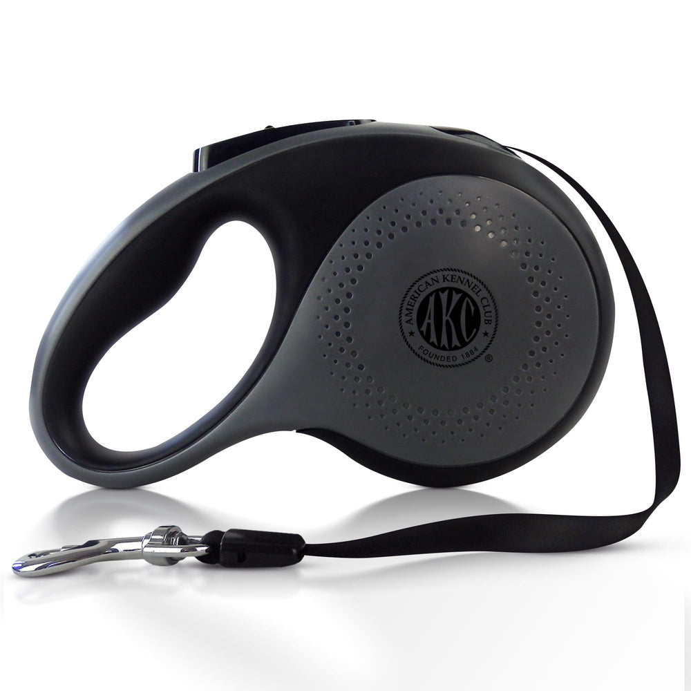 American Kennel Club retractable leash with extended reach enables safe, controlled exploration.