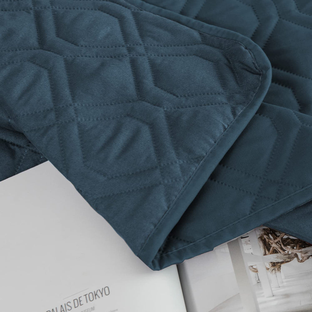 Ameritex close-up waterproof back layer blocks moisture from upholstery.