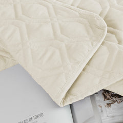 Ameritex close-up of cover protecting furniture from spills and pet hair.