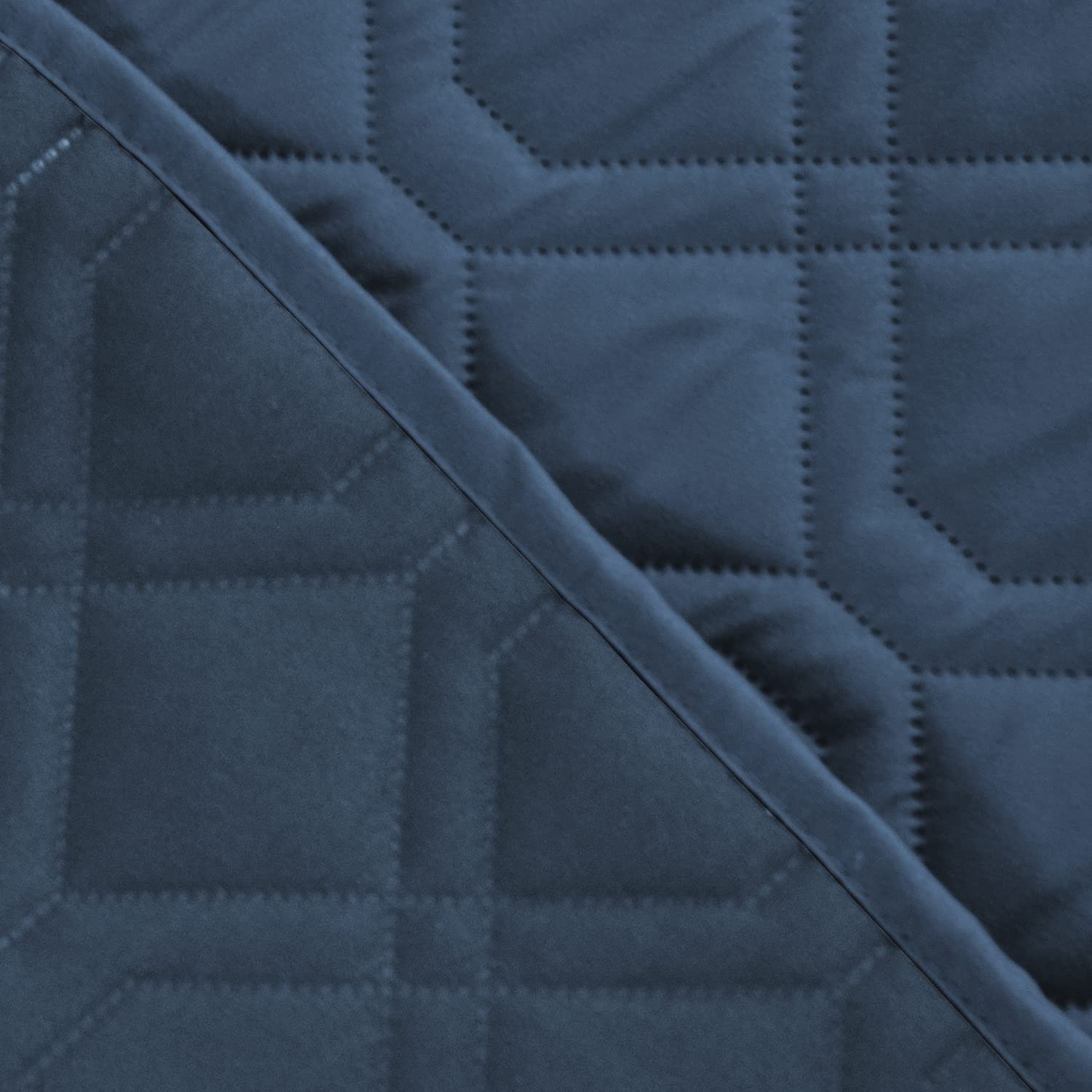 Ameritex waterproof reversible cover protecting furniture from stains