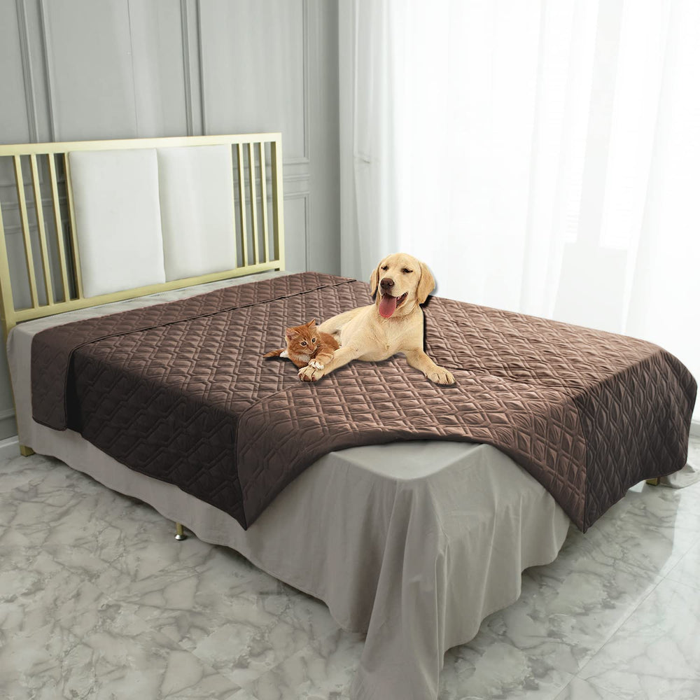 Ameritex waterproof blanket on a sofa protects furniture from pet paws and spills.