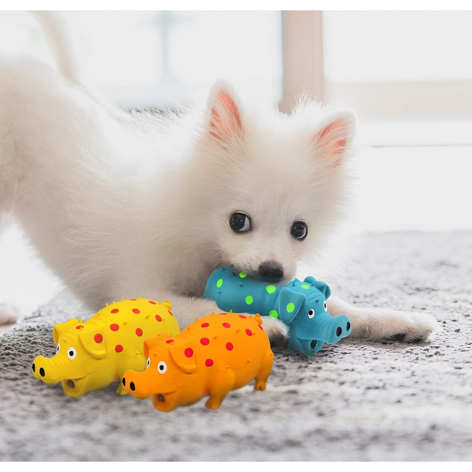 Andiker dots-textured latex toy closeup highlighting bite-friendly surface