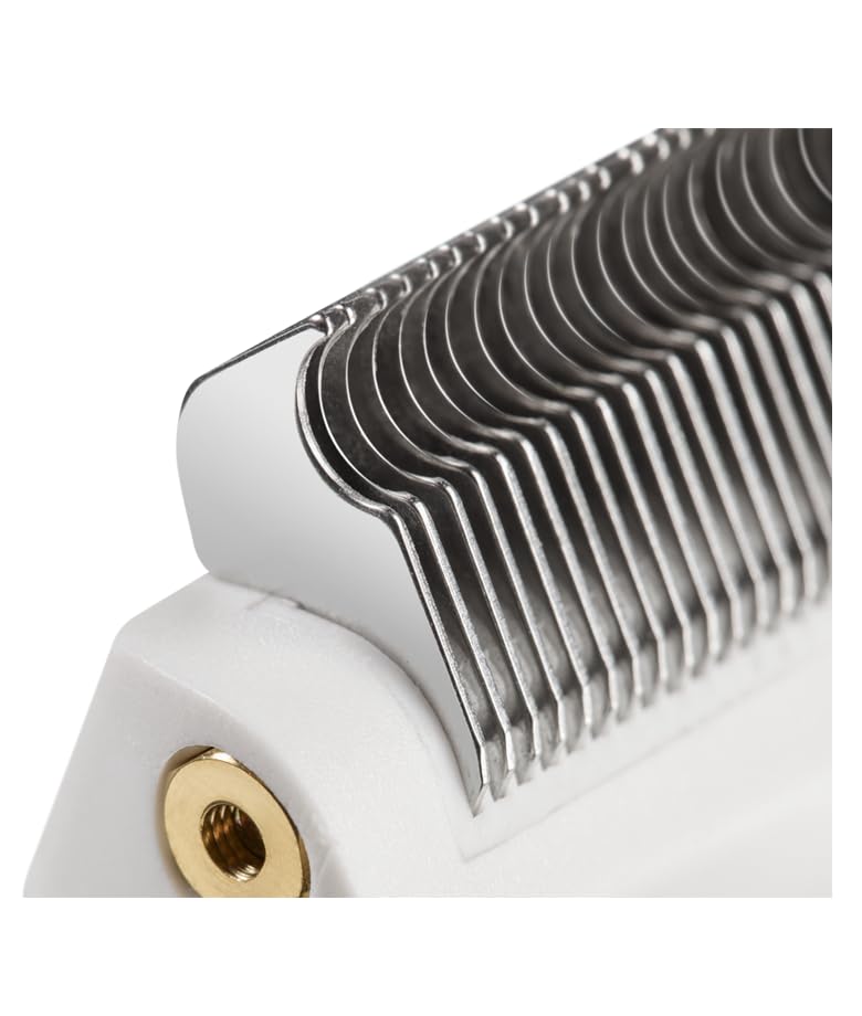 Andis Premium deshedding rake in salon use helps manage shedding in breeds