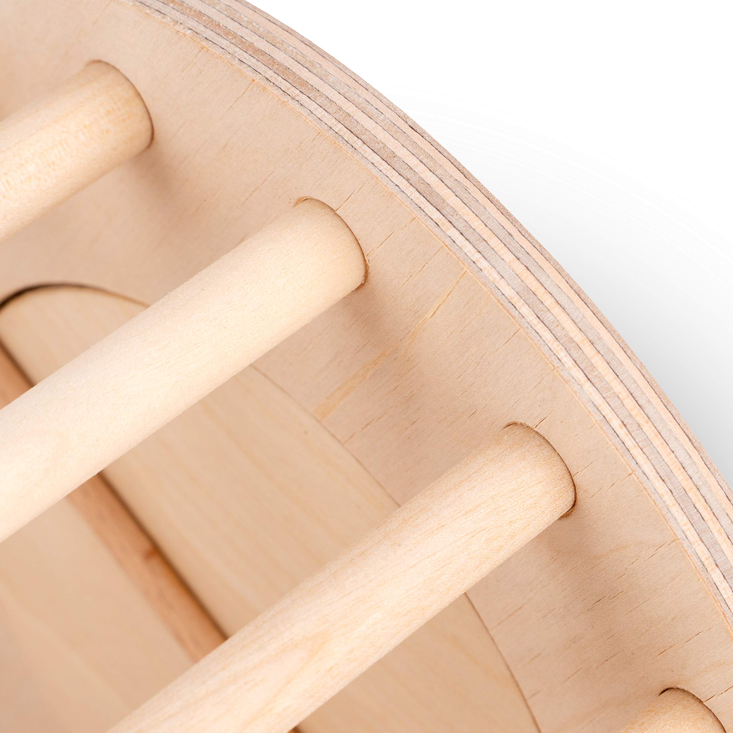 andwe hay feeder for small pets shown in a playpen during routine feeding.