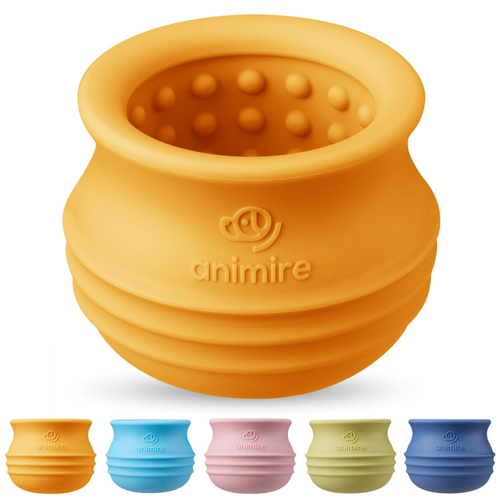 Animire treat-dispensing toy orange side view for engaging interactive play