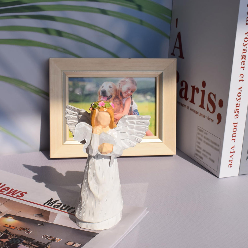 Anrkets dog remembrance angel figurine close-up showcases detailed craftsmanship for memorial displays.