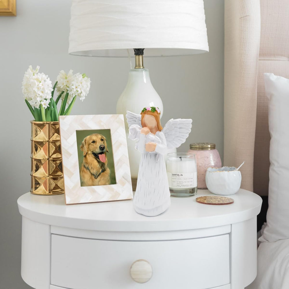 Anrkets hand-painted resin angel figurine features smooth lines and delicate, artisan-made details.