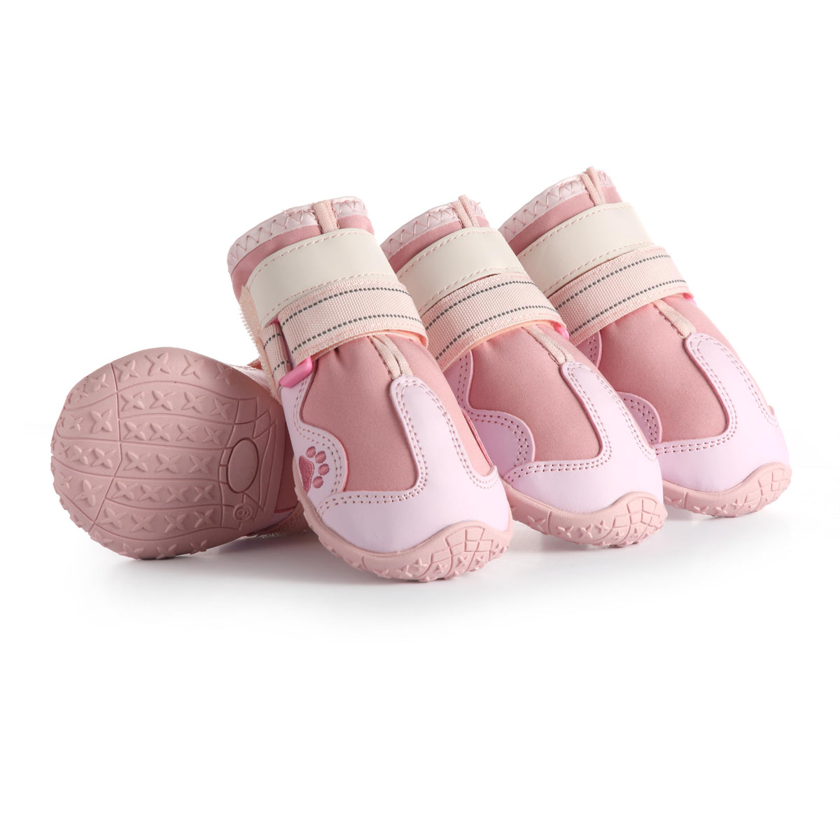 AOKOWN pink dog shoes size 4 on a dog's paw showing winter protection and traction.