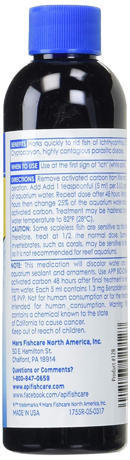 API Liquid Super Ick Cure being dosed in aquarium to combat ich safely