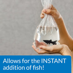 API QUICK START being poured into a new freshwater aquarium for immediate cycling.