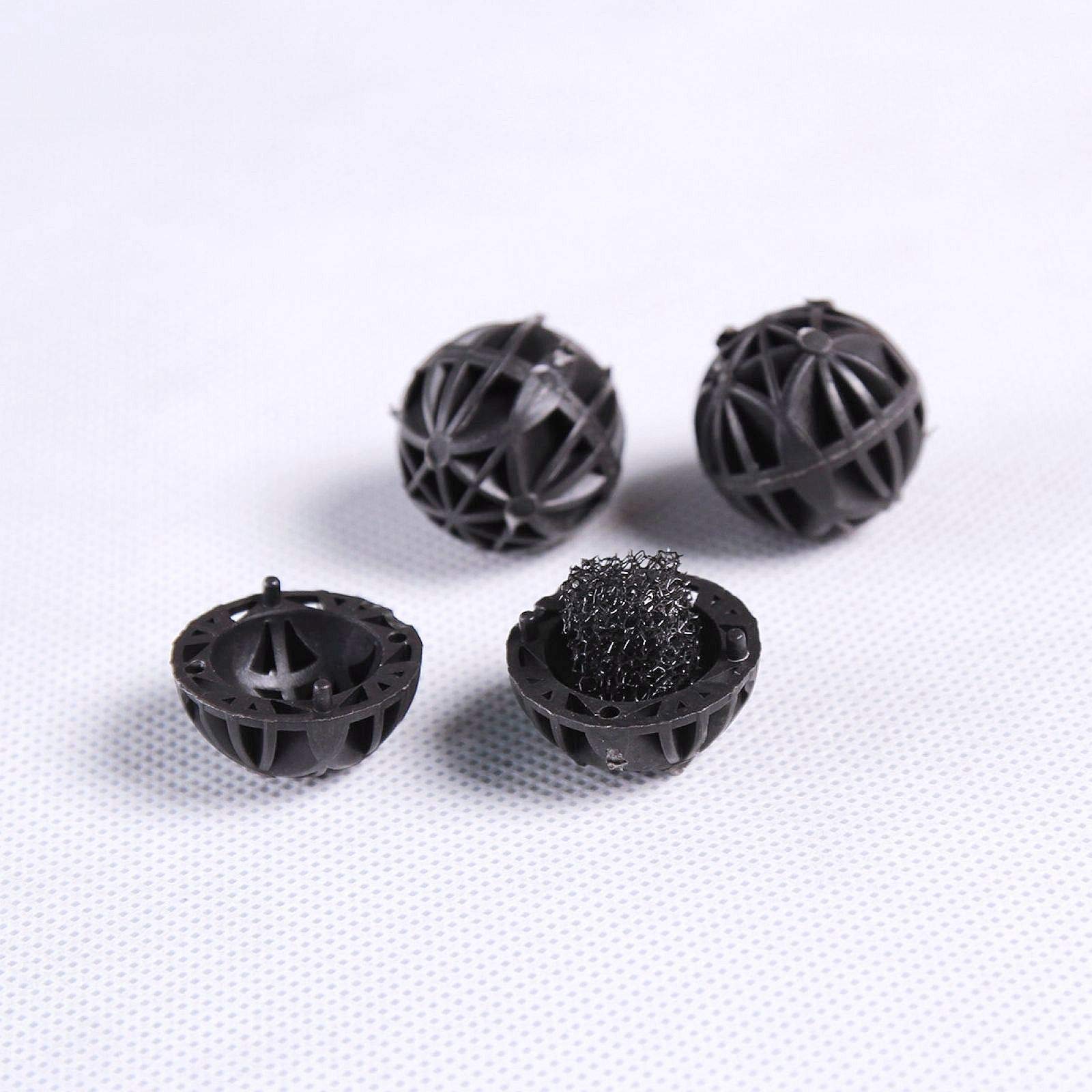 AQUANEAT bio balls closeup reveals internal surface crafted for robust biofiltration.