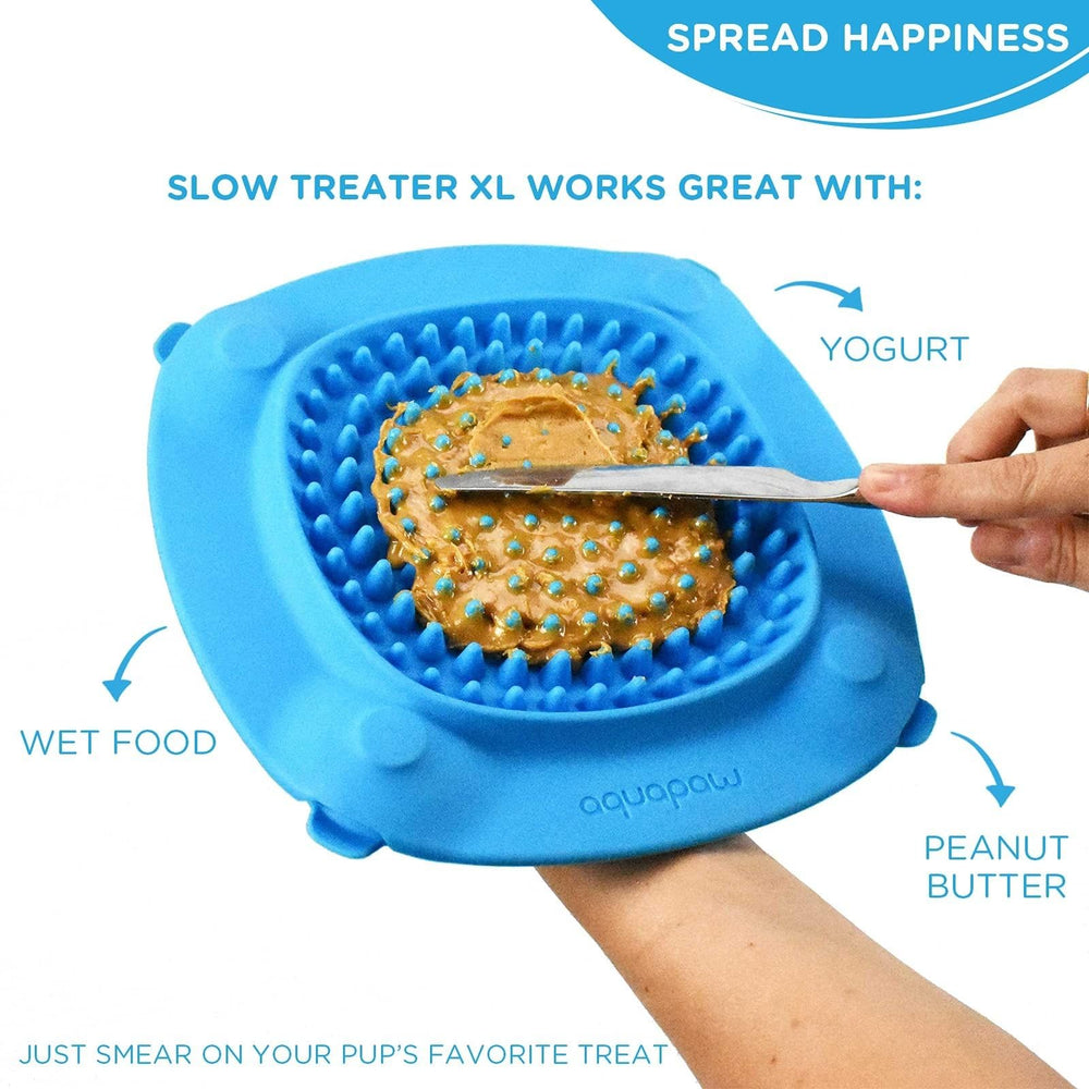 Aquapaw Lick Mat for dogs in shower with suction cups secures during use.