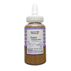 Aquatic Provisions Guppy Granulettes bottle shows tiny granules for small fish nutrition.