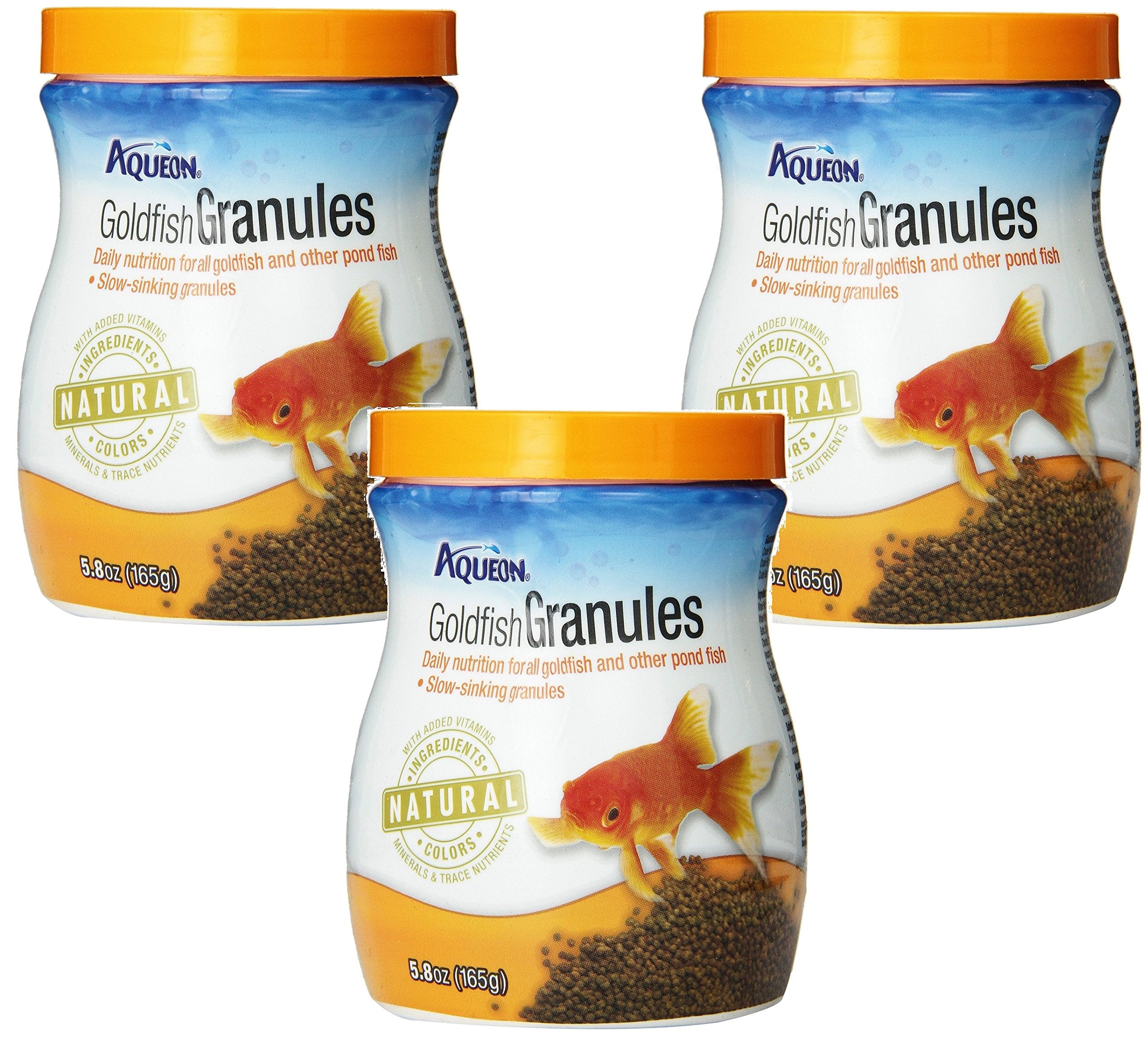 Aqueon Goldfish Granules 3-pack on shelf for easy daily feeding.