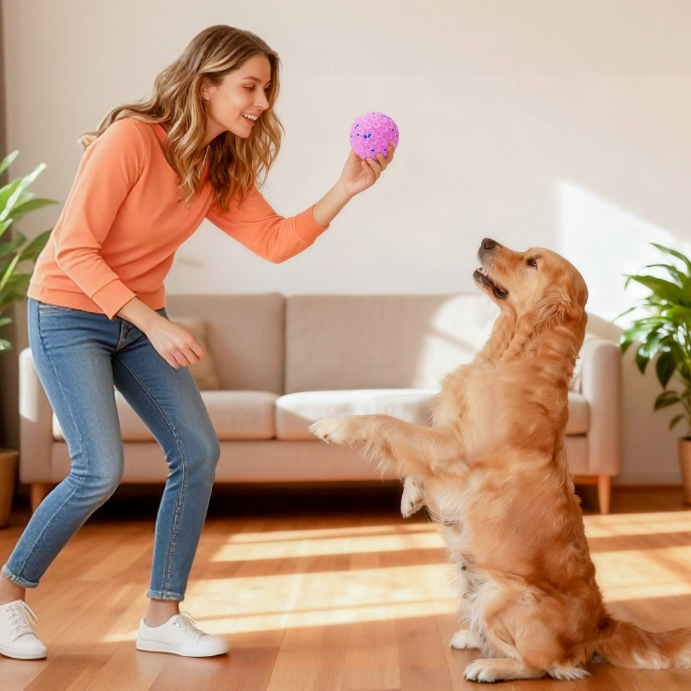 AronYada smart interactive dog ball ip54-washable image shows easy outdoor cleanup and water resistance.
