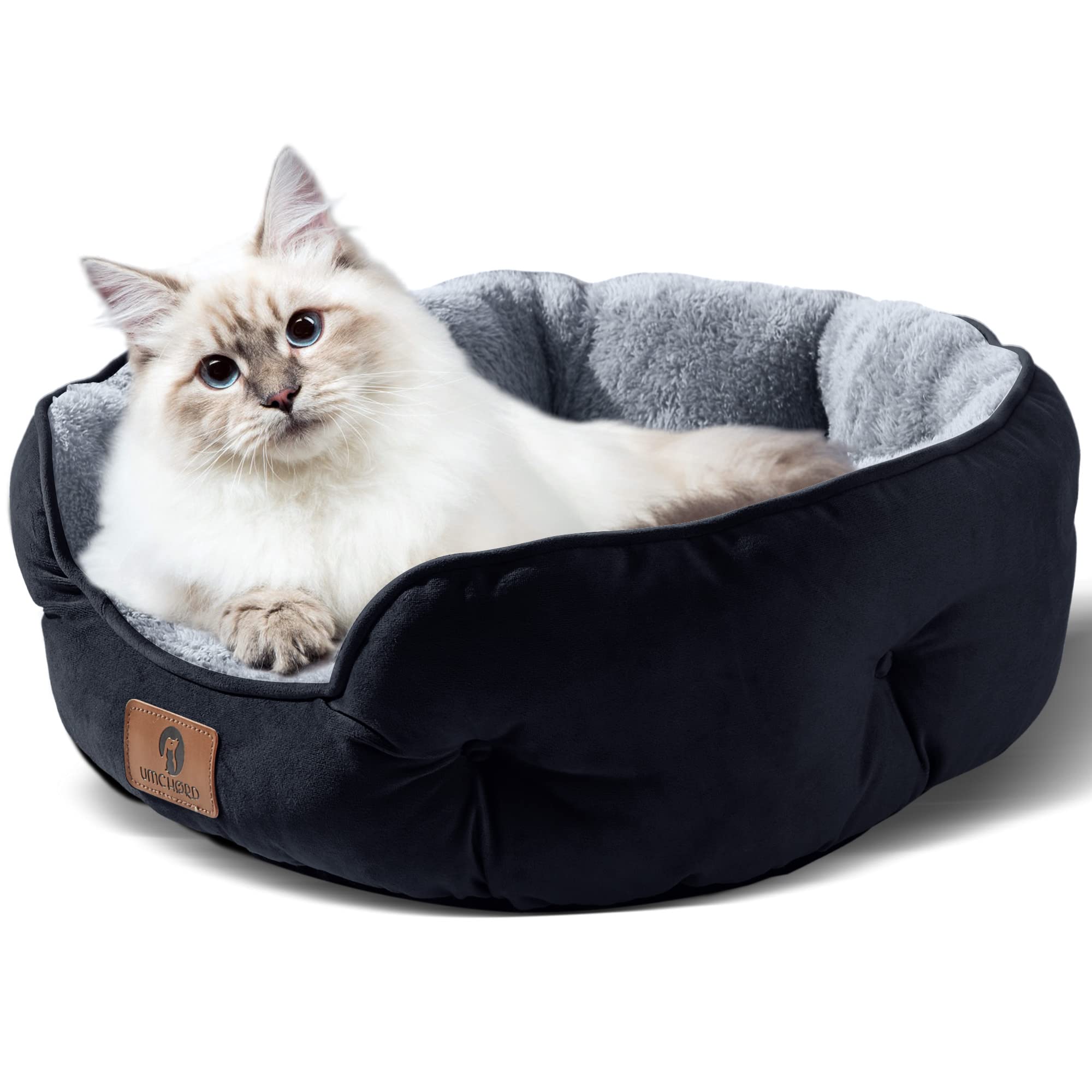 Asvin small dog bed features anti-slip bottom to stay put on slick floors.