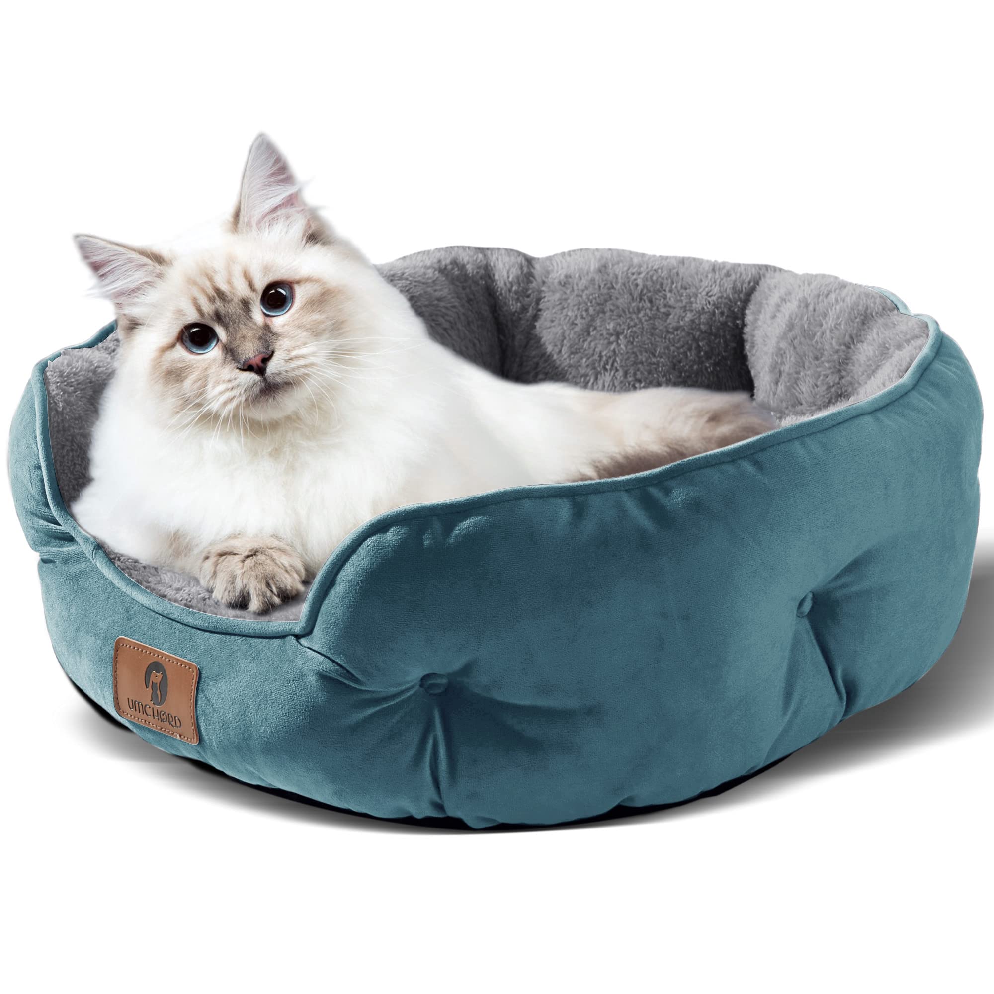 Asvin small dog bed round design supports head and neck for security.