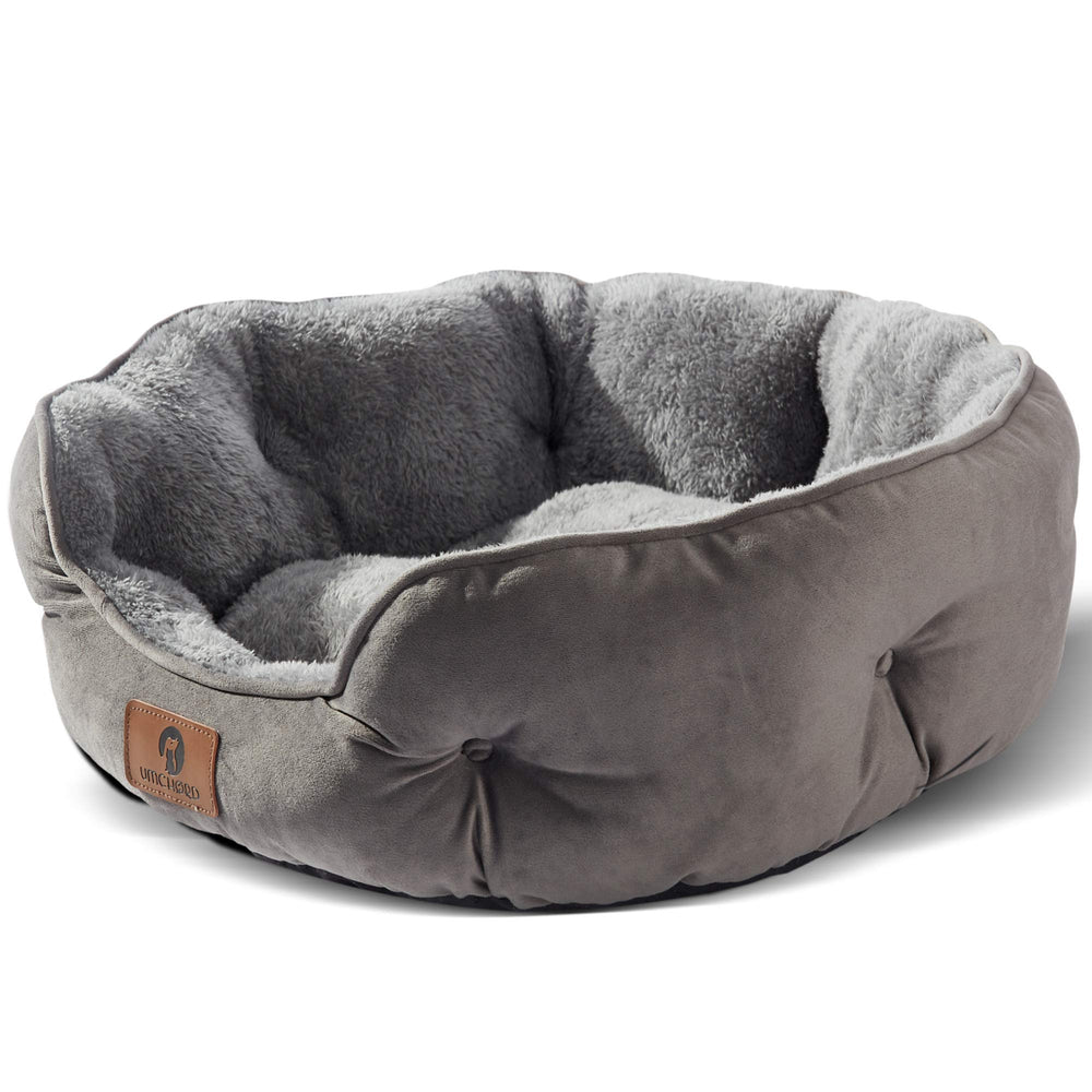 Asvin small dog bed in sherpa fleece for cozy naps.